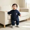 Mono de bebé, ropa de otoño, ropa infantil coreana, ropa Harbin, ropa de bebé de manga larga, ropa de otoño, ropa de escalada larga con solapa natong