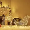 Escena navideña transfronteriza de arte en hierro con renos luminosos tirando de un trineo, arreglo combinado para decoraciones de centros comerciales y decoración de hoteles