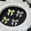 Joyería de Aleación Metálica para Uñas con Lazo al por Mayor Decoración de Uñas Simple de Lujo Ligero con Flecos Diamante Cruzado Nuevo Estilo Transfronterizo