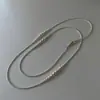 Collar largo de perlas de lujo ligero francés moda lujo ligero cadena de suéter de alta gama collar simple versátil de nicho venta al por mayor