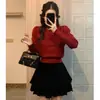 Top elegante de cuello redondo estilo coreano para primavera y otoño con mangas abullonadas y entallado en la cintura, suéter de punto liso hueco de invierno para mujer