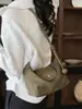 Bolso de axila de estilo francés de nicho transfronterizo para mujer, nuevo bolso de moda tipo albóndiga de gamuza para el trabajo, bolso de hombro y cruzado casual