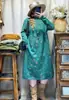 Vestido de punto floral vintage de cuello semi-alto para principios de primavera 2026 nuevo vestido base vintage de nicho para mujer