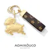 Colgante llavero año del cordero bañado en oro, accesorio para coche y bolso, regalo de Año Nuevo, amuleto de la suerte con temática de cordero