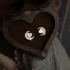 Pendientes de circonita lunar en forma de corazón, un accesorio popular y extremadamente hermoso, de moda para ir al trabajo, de lujo ligero, pendientes simples y de nicho