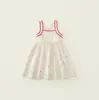 Top sin mangas de lunares de colores estilo coreano conjunto de verano para niñas 2026 estilo vacacional con volantes franceses conjunto de dos piezas