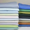 Tela de camisa de algodón puro lavado al agua 40 proceso completo lavado a la arena de algodón tela arrugada de primavera y verano para hombre y mujer