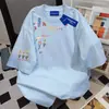 Camiseta de Verano Nueva de Manga Corta para Mujer con Estampado Floral de Letras Divertido y Elegante, Marca de Moda, Corte Holgado, Top Estilo Universitario