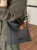 Bolso de axila retro de alta gama para mujer, nuevo bolso de hombro tipo cubo versátil de moda de verano para el día a día