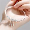 Versión coreana de la nueva pulsera de red de campanas atrapasueños, pulsera push-pull, viento frío, regalo 520, pulsera de plata con temperamento, venta al por mayor