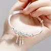 Versión coreana de la nueva pulsera de red de campanas atrapasueños, pulsera push-pull, viento frío, regalo 520, pulsera de plata con temperamento, venta al por mayor