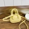 Bolso Mini Cuadrado de Mano para Mujer 2025 Primavera y Verano Nueva Tendencia Bolso de Hombro Simple Moderno Casual Bolso Cruzado