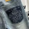 Venta al por mayor de moda para hombre Xintang Jeans ajustados pitillo retro bordados cónicos para primavera y otoño para hombre