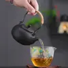 Tetera estilo crema Yue Rui Cerámica Agujero de bola Filtro Tetera Juego de té Kung Fu Estufa de té Fabricante Venta al por mayor