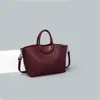 Bolso de mano de moda con patrón de lichi de lujo ligero transfronterizo, bolso de hombro vintage de alta gama para el trabajo, bolso tote estiloso de diseño nicho
