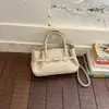 Bolso de mano de diseño de nicho transfronterizo de moda simple para mujer, estilo coreano retro, color liso, elegante, para ir al trabajo, de un solo hombro, cruzado