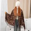Nueva capa de cachemira transfronteriza con cuello grande de piel, moda de invierno estilo étnico, cálida de uso diario vintage con borlas