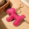 15 Colores Venta Directa de Fábrica Transfronterizo Dibujo Animado Perrito Colgante para Bolso Creativo Cuero Perrito Llavero para Coche Colgante