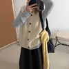 Nuevo chaleco cárdigan sin mangas de otoño, prenda exterior retro calada, chaleco de punto, top chaleco versátil para capas