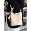 Nova Bolsa de Mão Estilo Coreano, Nicho, Estilo Ins, Elegante e de Alta Qualidade, Formato de Balde, Bolsa Transversal Feminina Moderna e Versátil com uma Pequena Bolsa Interna