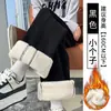 Pantalones nuevos para mujer Otoño/Invierno 2026, corte holgado versátil, adelgazantes, elegantes, casuales, con abertura, adecuados para ir al trabajo, forrados de polar