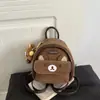 Mochila Oso Pequeño 2026 Otoño Nuevo Retro Diseño de Nicho Mochila Escolar para Niños Mochila Pequeña de Viaje