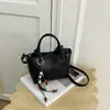 Bolso tipo cubo nuevo, simple y elegante, Otoño 2026, Bolso de mano chic vintage para mujer, Bolso versátil para el trabajo, de hombro y cruzado