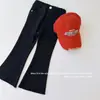 Pantalones Vaqueros Acampanados Ajustados de Color Sólido Rasgados Casuales Estilo Coreano Otoño Nuevo 2026 para Niños Pantalones Skinny