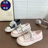 Estilo Coreano 2026 Primavera/Verano Nuevos Zapatos Casuales de Lona para Mujer Estudiante Versátiles Zapatos Blancos de Caña Baja Casual Zapatos de Tabla Estrella Modernos