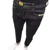 Jeans Ajustados Negros para Hombre 2026 Primavera Nuevos Versátiles Elásticos Corte Delgado Pantalones Cortos Pantalones Largos Elásticos Marca de Moda
