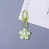 Llavero de Flor de Cerezo Plano Colorido Lindo Accesorio Pequeño DIY Decoración de Bolsa Moda Versátil Colgante Decorativo Venta al por Mayor