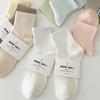 Calcetines Zhuji de color puro para mujer, estilo ins de primavera y verano, calcetines deportivos de algodón de moda, calcetines de media pantorrilla antideslizantes de doble elasticidad, venta al por mayor