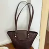 2026 Verano Otoño Nuevo Bolso de Cesta de Verduras de Mano de Gama Alta Casual Versátil Textura Bolso Cubo de Hombro Único