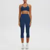 Conjunto deportivo de yoga con sujetador de yoga sin costuras de nuevo estilo transfronterizo con relleno incorporado, alta elasticidad, secado rápido y pantalones capri para correr