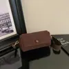 Bolsa feminina retro transfronteiriça pequena, nicho 2026 nova bolsa de ombro transversal casual da moda, bolsa cilíndrica estilosa