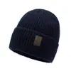 Gorro de punto liso para otoño e invierno para hombres y mujeres, gorro de lana grueso y cálido, gorro versátil con borde enrollado, gorro de punto para exteriores
