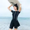 Traje de baño deportivo para mujer talla grande traje de buceo manga corta falda una pieza cremallera Baño termal traje de baño talla grande comercio exterior Mayoreo