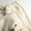 Calça larga versátil 100% lã para mulheres, solta e grossa, adequada para outono e inverno, corte reto, comprimento até o chão, com efeito de caimento, calça casual branca de caxemira