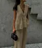 Conjunto de chaleco de cuello en V estilo francés y pantalón largo, nuevo para 2026, con diseño entallado a la cintura, top sin mangas y un look chic y profesional para la oficina