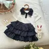 {Timo Girls} Conjunto de Verano para Niñas, Conjunto de Dos Piezas Estilo Preppy, Elegante Top de Manga Corta y Falda de Volantes, Conjunto con Bloques de Color