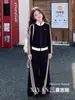 Conjunto de outfit de otoño para niñas 2026 nuevo estilo súper popular conjunto deportivo de dos piezas para niñas chaqueta de calle moderna y a la moda para niños