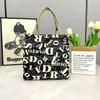 Nova moda de verão bolsa de mão grande capacidade estampa de animação de desenhos animados bolsa de ombro para trabalhadores de escritório bolsa para marmita atacado