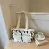 Bolso de lona con estampado de letras y múltiples bolsillos, modelo nuevo 2026, bolso de mano de alta gama, bolsa de compras, bolso de hombro, bolso de mano para el día a día