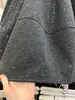 Falda midi de lana mezclada, minimalista y a la moda, con adornos de pedrería, estilo coreano, para mujer, colección otoño 2026, corte holgado, falda versátil de retazos en línea A