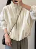 Chaqueta cortavientos de color liso con diseño de cordón y cuello alto estilo coreano para otoño 2026, para mujeres petite, holgada y elegante