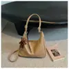 Bolso tote retro simple de comercio exterior transfronterizo para mujer, nuevo bolso de moda casual de gran capacidad para el día a día, bolso de hombro y cruzado