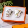 Nuevo Estilo Europeo Hueso de China Infantil Lindo Juego de Vajilla Serie Animales Divertidos Infantiles Juego de Cuatro Piezas Plato Taza Regalo para el Hogar