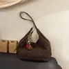 Bolso de Hombro Retro Estilo Coreano Simple para el Trabajo Otoño 2026 Nuevo Lanzamiento de Nicho Elegante de Alta Apariencia Bolso de Mano para Mujer