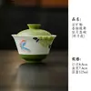 Juego de té de cerámica pintado a mano bajo vidriado con motivos de mariposas y flores, que incluye un gaiwan, tetera, taza de té, platillo, posavasos y vaso de agua