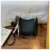 Comercio Electrónico Transfronterizo Más Vendido Nicho Retro Bolso de Axila Nuevo para Mujer Gran Capacidad Versátil para el Trabajo Bolso de Hombro Cruzado